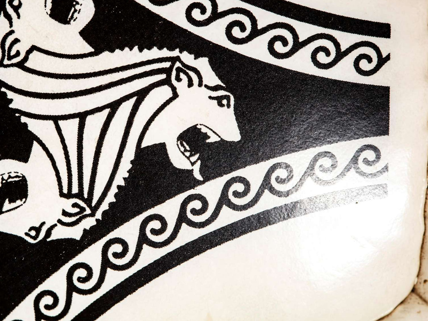 Zoom de león tricefalo Etrusco