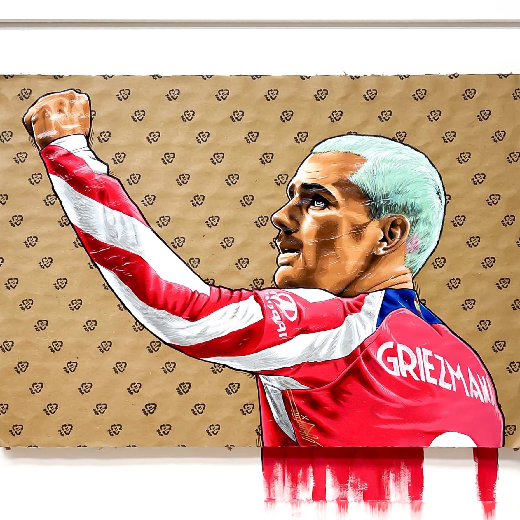 Retrato de Antoine Griezmann pintado a mano con acrílico sobre cartón de embalaje, enmarcado en blanco. Obra única. Medidas 40x50cm